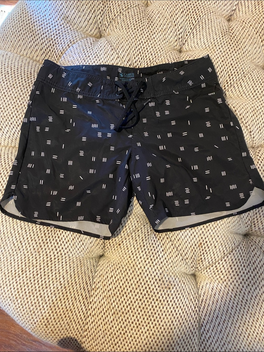 Carve Designs Black Swim Shorts with White Dash Pattern